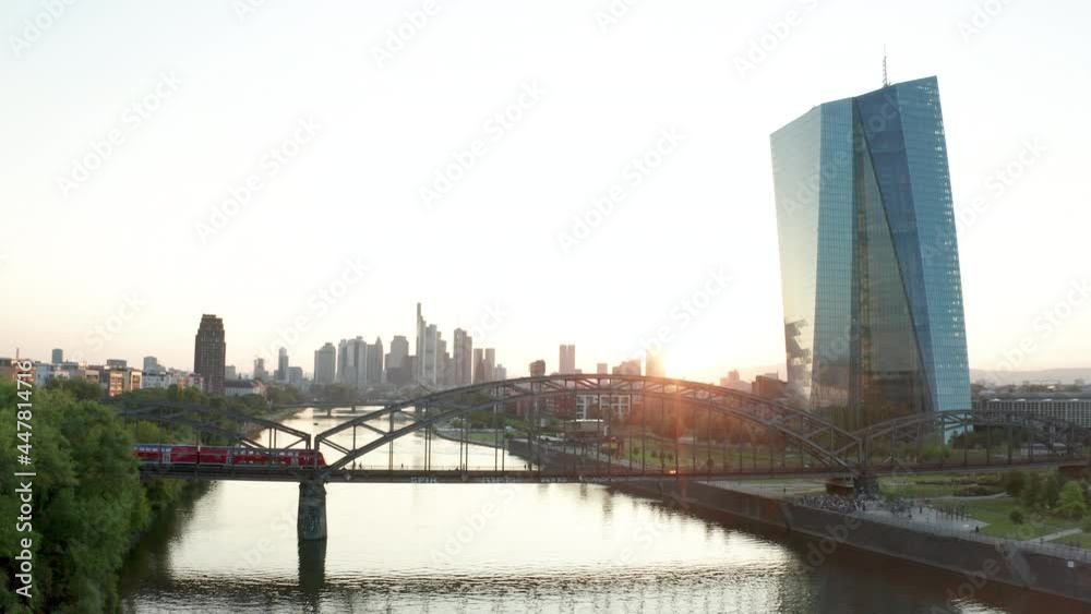Aerial panorama drone shot European Central Bank Frankfurt Europäische Zentralbank EZB ECB with the skyline sunset Aerial panorama drone shot European Central Bank Frankfurt Europäische Zentralbank EZB ECB with the skyline sunset