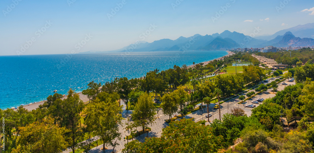 ANTALYA, TURKEY: Bird's-eye view of Konyaalti beach, Mediterranean Sea and mountains in summer.