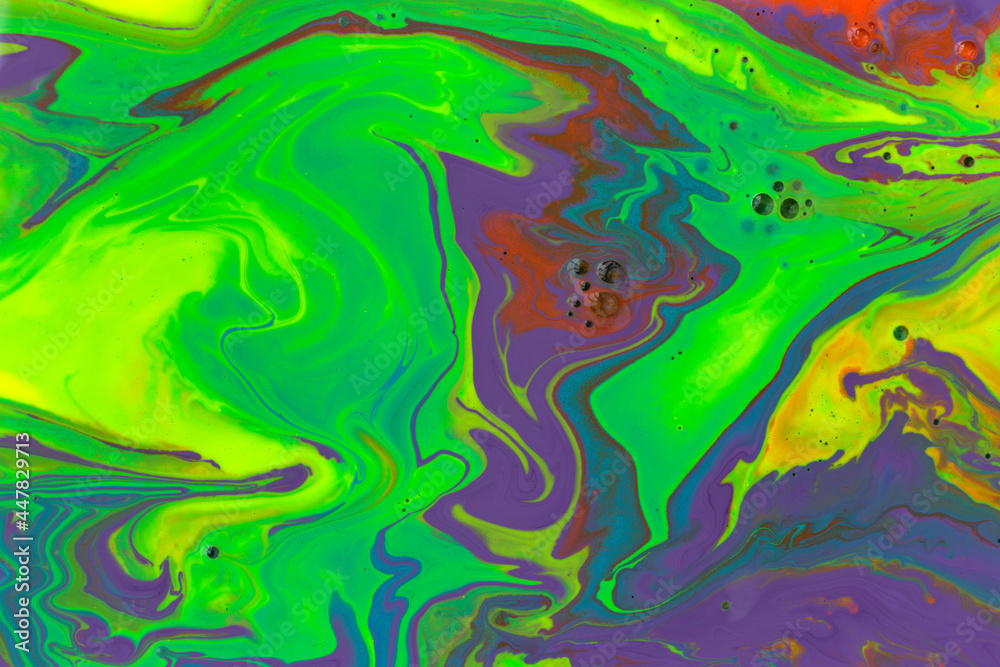 Green and violet marble abstract acrylic background. Vivid artwork texture. Agate ripple pattern.