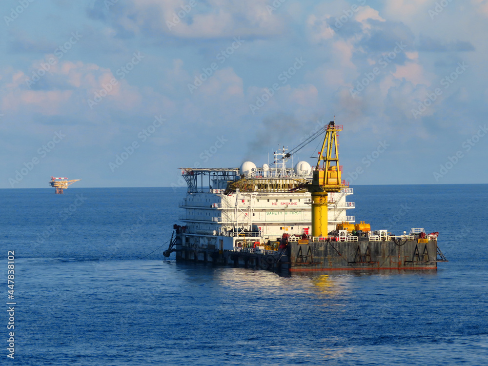 Fototapeta premium A typical Offshore Accommodation and Work Barge in the Oil and Gas industry. Offshore Accommodation Barge to serve as an offshore hotel to personnel and crew.