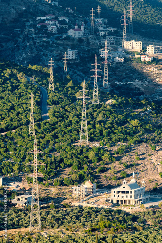 Transmission lines cutting though villages in rural Lebanon