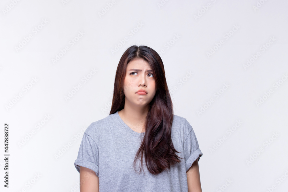 Image of feeling excited, shock, surprise and happy. Young asian woman standing on white background. Female face expressions and emotions body language concept. Image of feeling excited, shock, surprise and happy. Young asian woman standing on white background. Female face expressions and emotions body language concept.