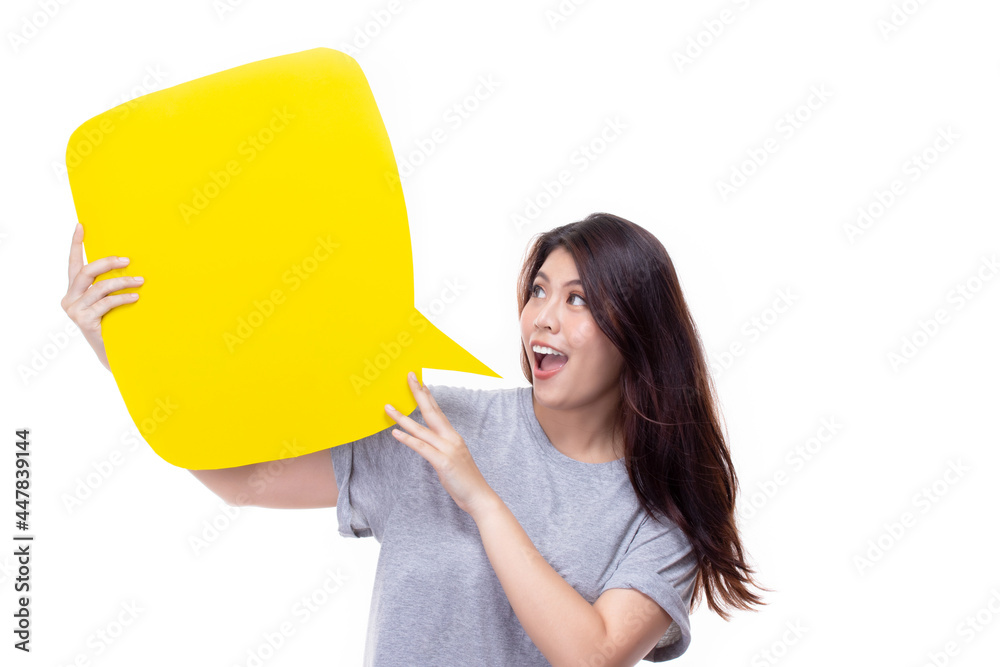 Attractive beautiful young asian woman smile and excited holding empty speech bubble isolated on white background. Empty speech bubble concept. Attractive beautiful young asian woman smile and excited holding empty speech bubble isolated on white background. Empty speech bubble concept.