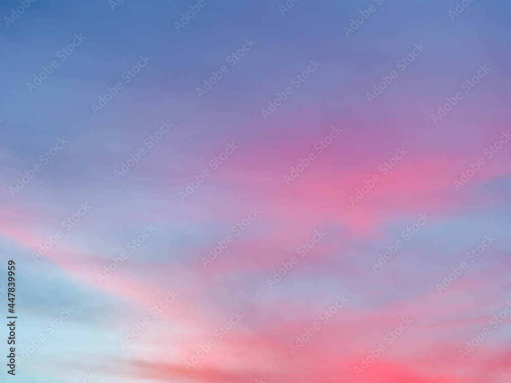 Colored clouds in the sunset sky.