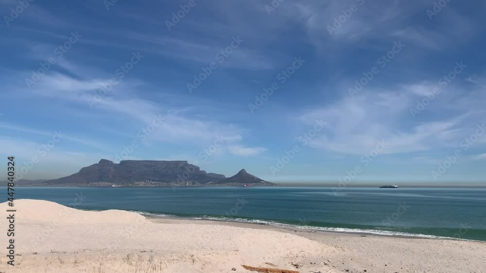 Table Mountain Cape Town container ships Table Bay from Bloubergstrand white sandy beach blue sea waters Table Mountain Cape Town container ships Table Bay from Bloubergstrand white sandy beach blue sea waters