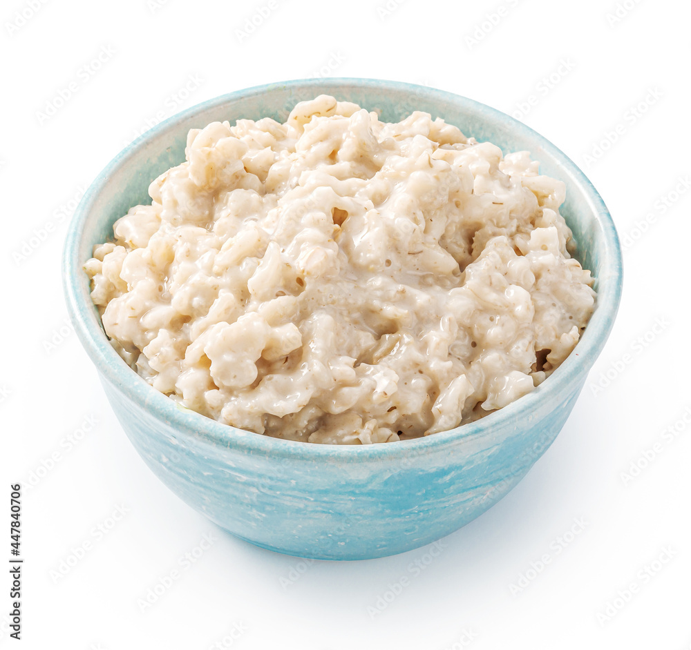 Oatmeal porridge in blue bowl. Porridge isolated on white background. Bowl of porridge for package design. Oatmeal porridge in blue bowl. Porridge isolated on white background. Bowl of porridge for package design.