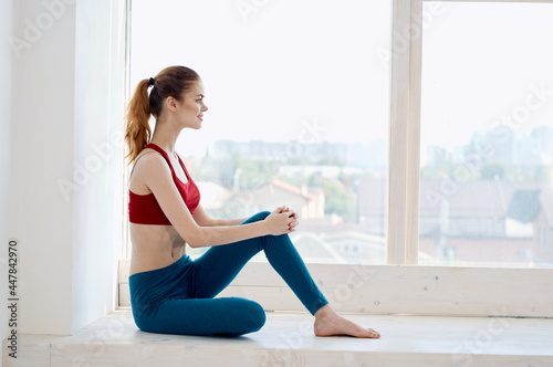 Free Download woman sitting on the floor exercise yoga fitness lifestyle - GFXLoad