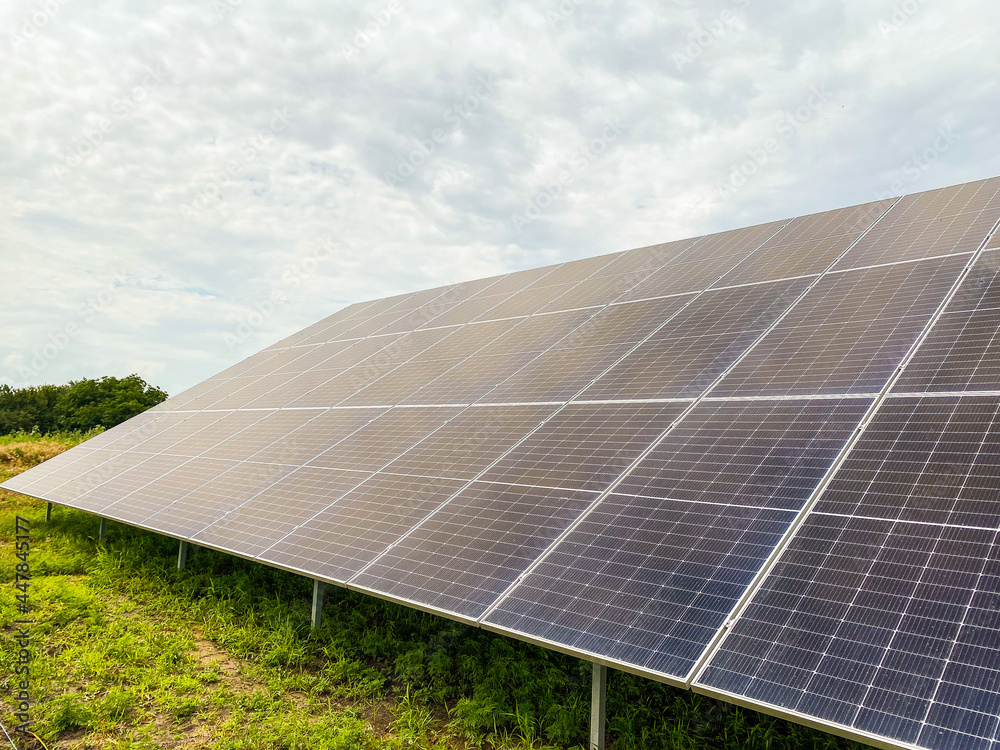 Solar panels installation: Solar panel on blue sky background, Alternative energy concept, Clean energy, Green energy Solar panels installation: Solar panel on blue sky background, Alternative energy concept, Clean energy, Green energy