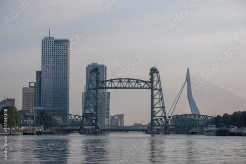 City of Rotterdam downtown skyline at dusk in South Holland, Netherlands, Erasmus Bridge © Tjeerd