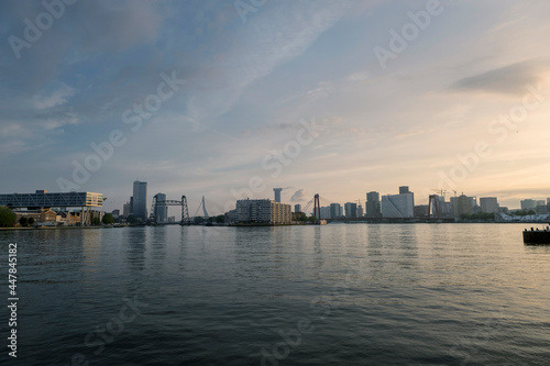 City of Rotterdam downtown skyline at dusk in South Holland  Netherlands  Erasmus Bridge