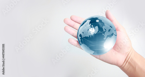 Glass globe in hand Energy saving concept   image furnished by NASA