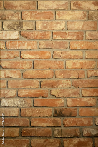 Brick wall. The wall is made of red  old bricks. Vintage background.