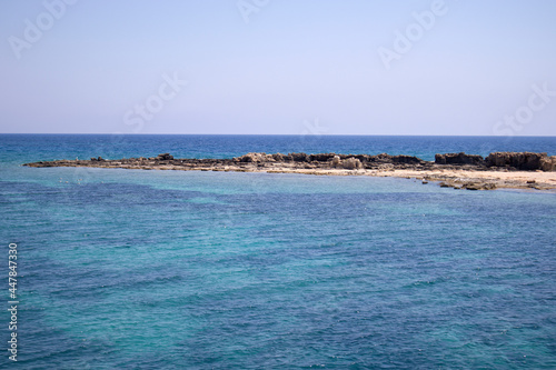 Calm  turquoise clear water for swimming and snorkeling underwater at sand beach