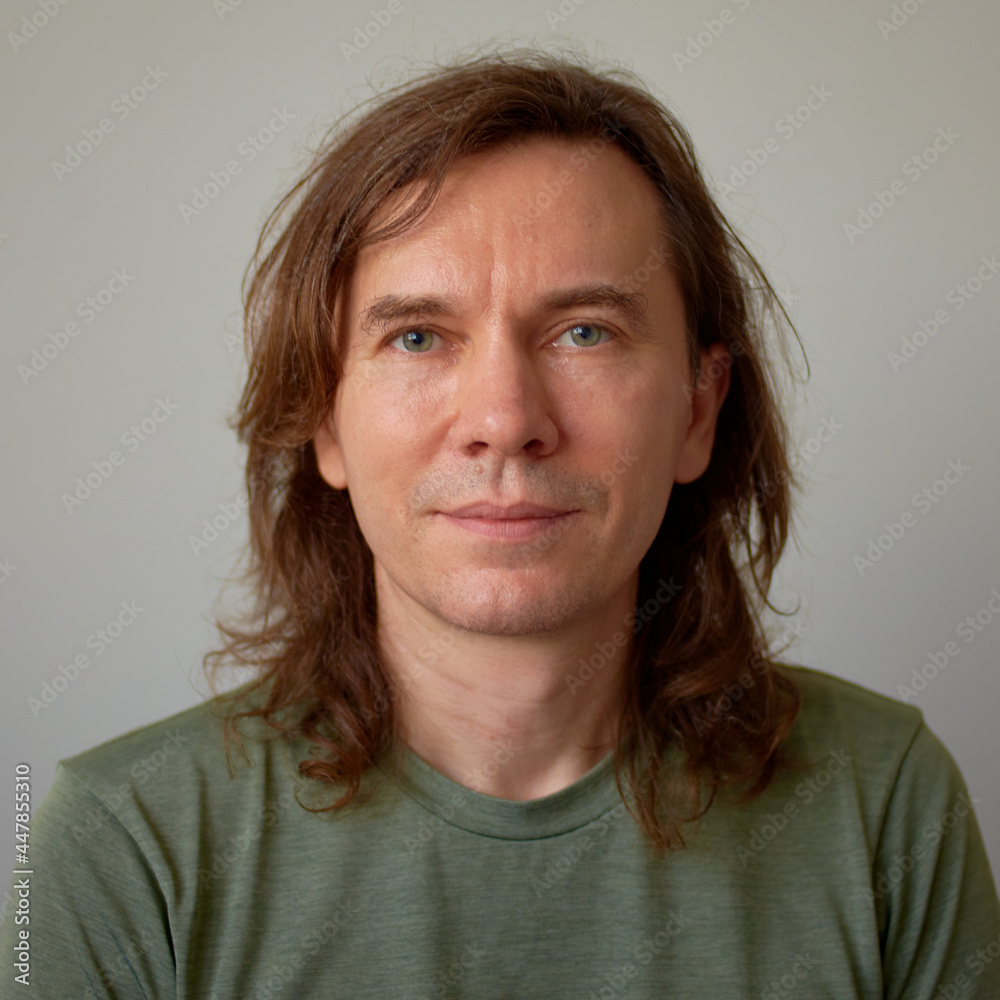 Man posing on the white background.