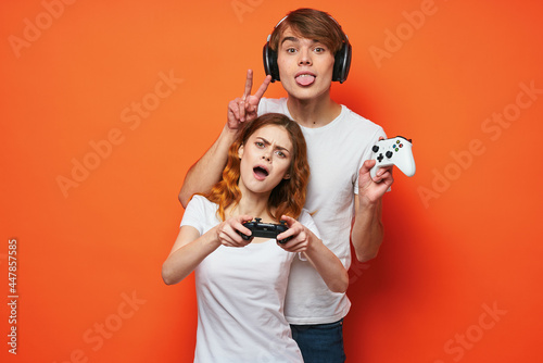 boy and girl playing games game console entertainment