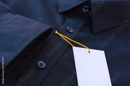 Close up of dark Men's shirt.