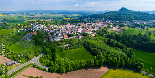Aerial view of the city Kalchreuth in Germany, on a cloudy day in spring.