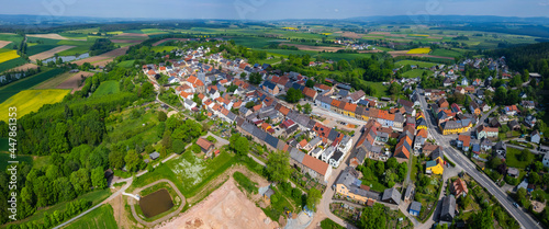 Aerial view of the city Kalchreuth in Germany  on a cloudy day in spring.