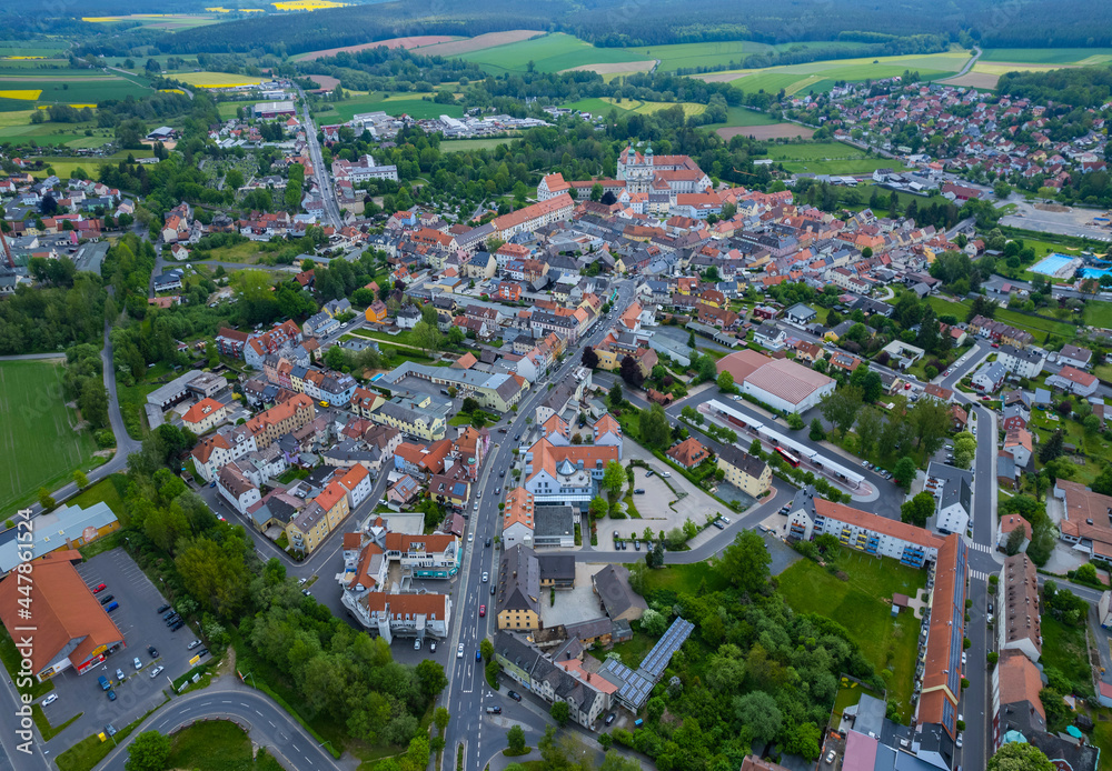 Aerial view of the city Waldsassen in Germany, on a cloudy day in spring.
