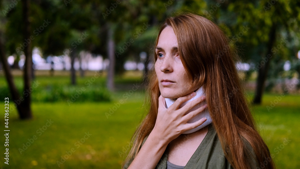Naklejka premium Rotary subluxation atlanta, a woman wears a cervical collar from injury, neck stretching, muscle pain, concussion, sprain of the ligaments, displacement of the vertebrae