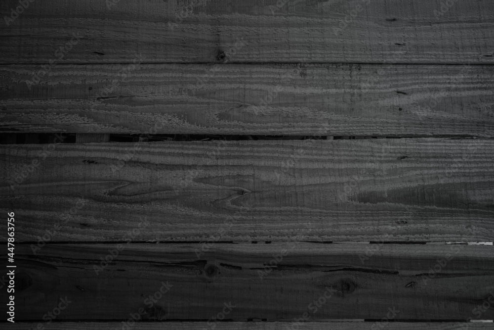 Naklejka premium Grunge dark wood plank texture background. Vintage black wooden board wall antique cracking old style background objects for furniture design.