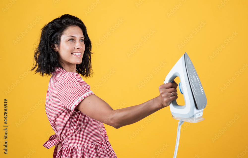 Iron works everywhere. retro girl with electric iron. vintage woman ironing clothes. housekeeping. pinup girl use steaming iron. home appliance. housekeeper woman ironing. happy and smiling housewife Iron works everywhere. retro girl with electric iron. vintage woman ironing clothes. housekeeping. pinup girl use steaming iron. home appliance. housekeeper woman ironing. happy and smiling housewife