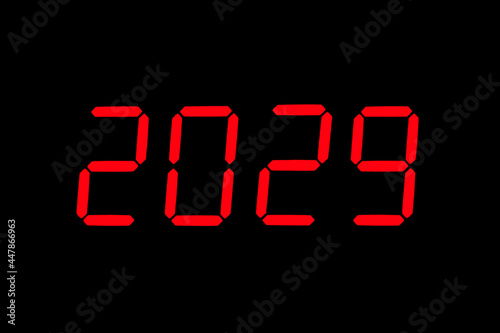 The dial of the electronic clock which shows the year 2029