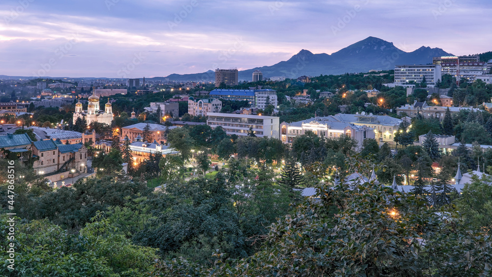 Naklejka premium Aerial view of the town and Beshtau mount at night. Pyatigorsk, Stavropol Krai, Caucasus, Russia.