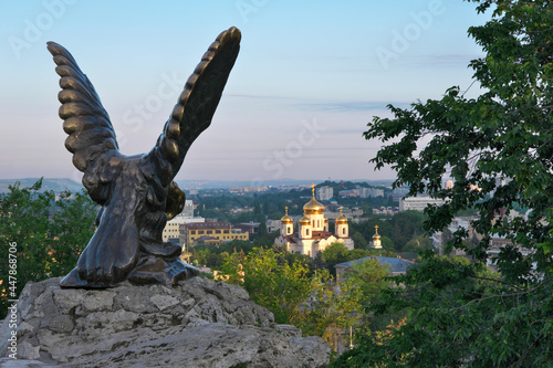 Sunrise view of Eagle on Hot mount (Goryachaya gora) and Spassky cathedral. Pyatigorsk, Stavropol Krai, Caucasus, Russia. photo