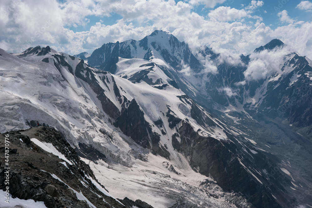 Obraz premium View of Mayly and Kolka glaciers on sunny summer day. North Ossetia–Alania, Caucasus, Russia.