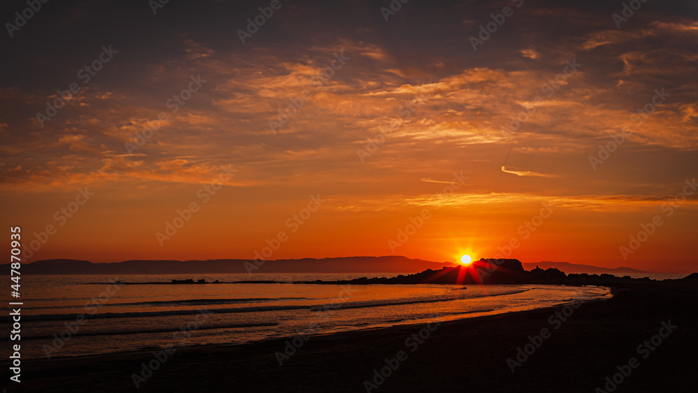 Sunset on the beach at the greek village Arkoudi Sunset on the beach at the greek village Arkoudi