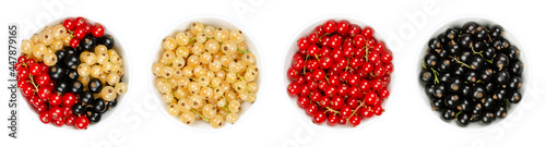 Canvas Print White, red and black currant berries in white bowls