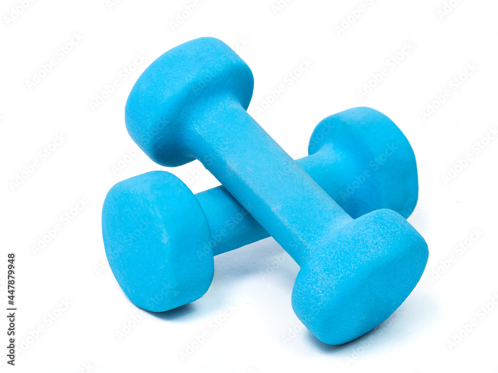 blue fitness dumbbells on a white background. the concept of a healthy lifestyle. fitness attributes blue fitness dumbbells on a white background. the concept of a healthy lifestyle. fitness attributes
