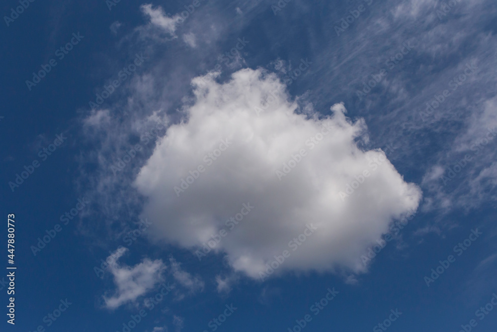 small cloud in a blue sky