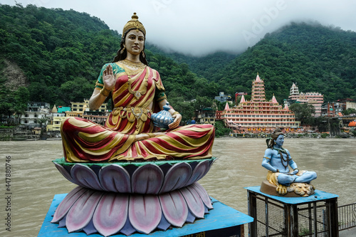 Rishikesh, India - July 2021: Views of the Swarg Niwas Temple from the Sai Ghat in Rishikesh on July 20, 2021 in Uttarakhand, India. photo
