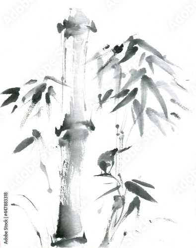 Little bird sitting on bamboo branch