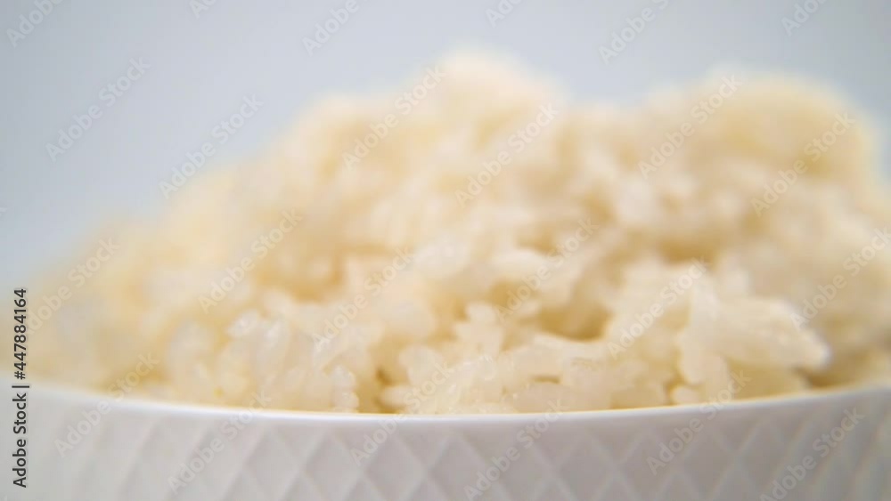 Boiled rice for rolls on a white background
Boiled rice for rolls on a white background