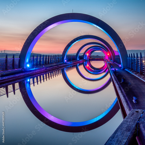 Circular reflections of The Portal at Falkirk Wheel at sunset