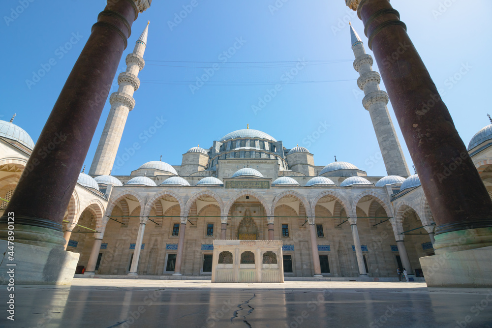 Fototapeta premium Suleymaniye Mosque in Istanbul. Ottoman architecture. Ramadan, iftar, laylat al-qadr, islamic new year background photo. Travel to Istanbul.