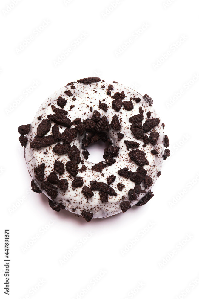 top view of chocolate donut with toppings on pure white background top view of chocolate donut with toppings on pure white background