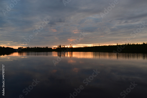 beautiful sunset on the lake © Vasiliy Shcherbatykh