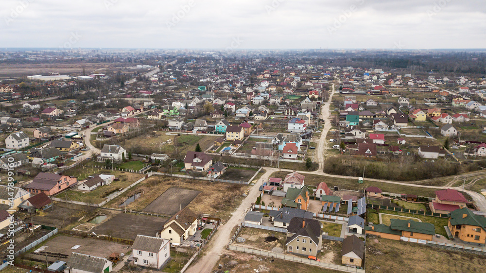 Aerial view of a village in Ukraine with houses and country roads