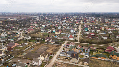 Aerial view of a village in Ukraine with houses and country roads