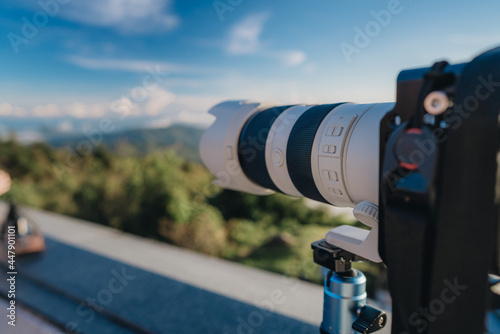 Man photographer shooting sunset at the highest point in Thailand