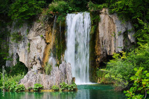 Beautiful splashes of water and trekking trail on waterfalls of Croatia national park