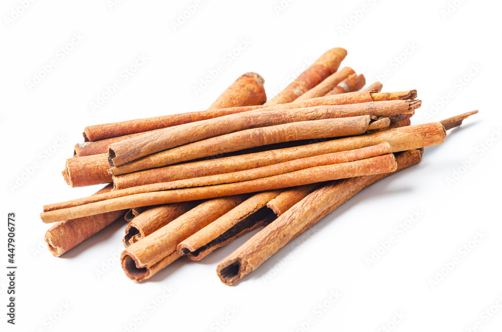 Cinnamon sticks on white.