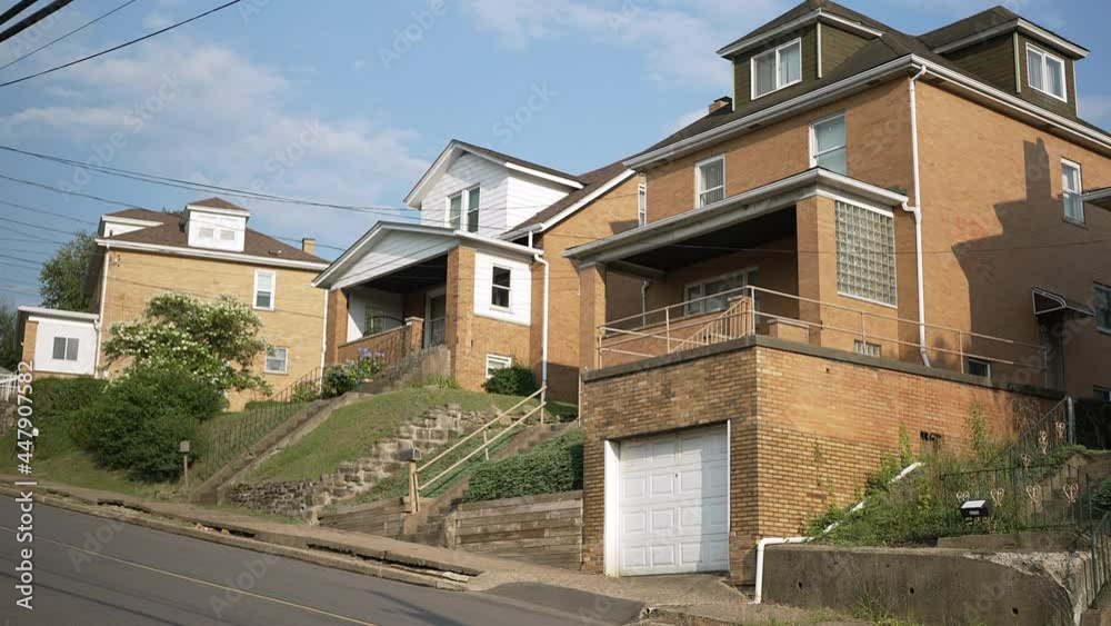 A day or early evening view of typical yellow brick western Pennsylvania homes. Pittsburgh suburbs. A day or early evening view of typical yellow brick western Pennsylvania homes. Pittsburgh suburbs.