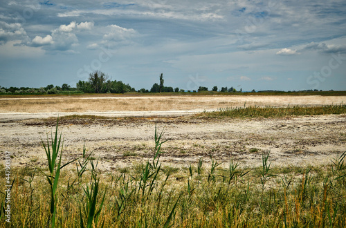 grassland with dry salt lake in pannonian national reserve parkia photo