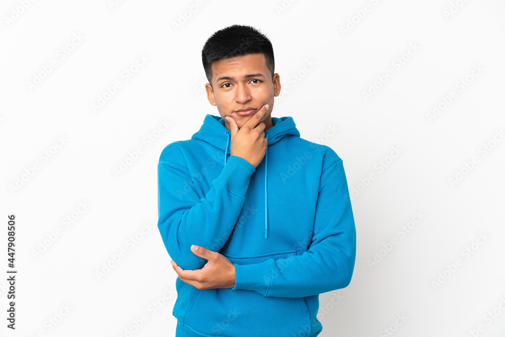 Young Ecuadorian man isolated on white background thinking Young Ecuadorian man isolated on white background thinking