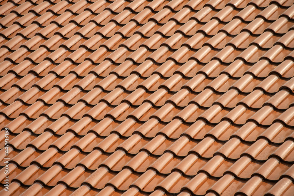 Repetitive pattern of orange roof tile Repetitive pattern of orange roof tile